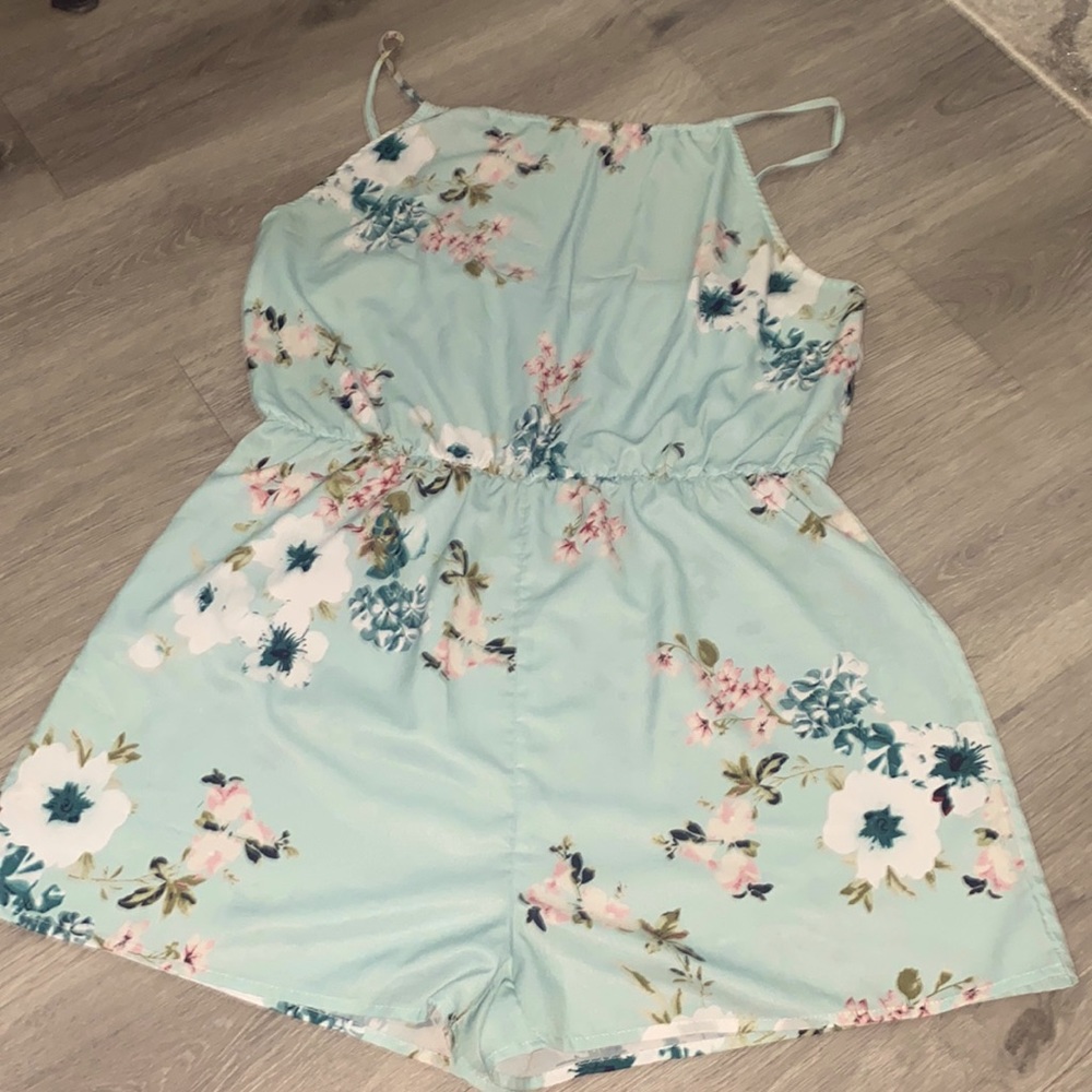 This is a real flowered jumpsuit size XL/12 from shien brand new wasn’t used